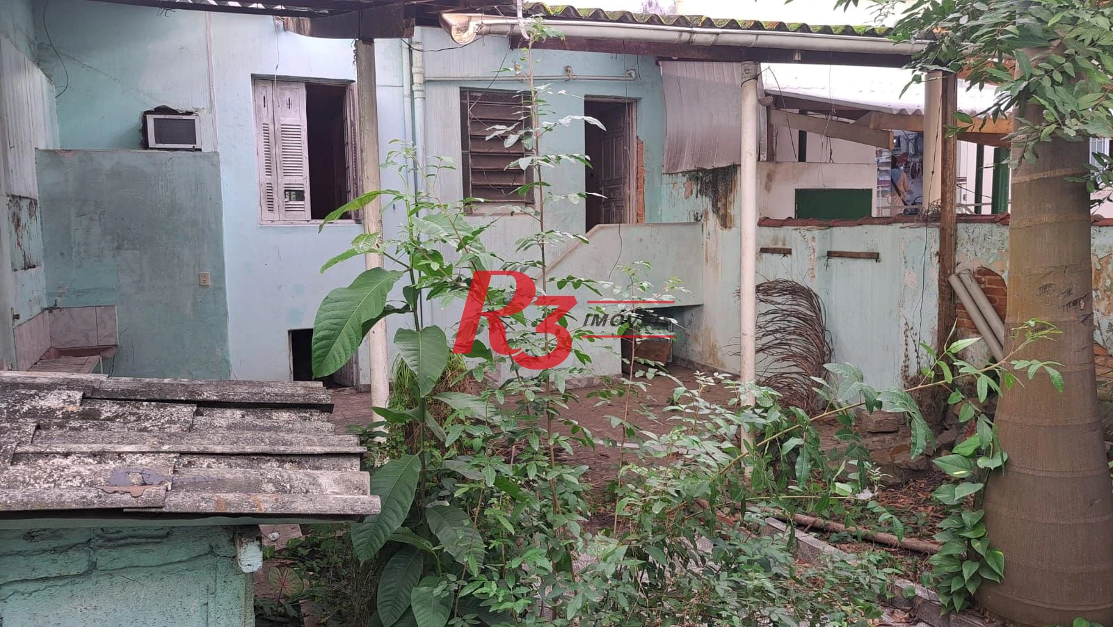 Casa com 3 dormitórios à venda, 200 m² por R$ 1.300.000,00 - Vila Belmiro - Santos/SP