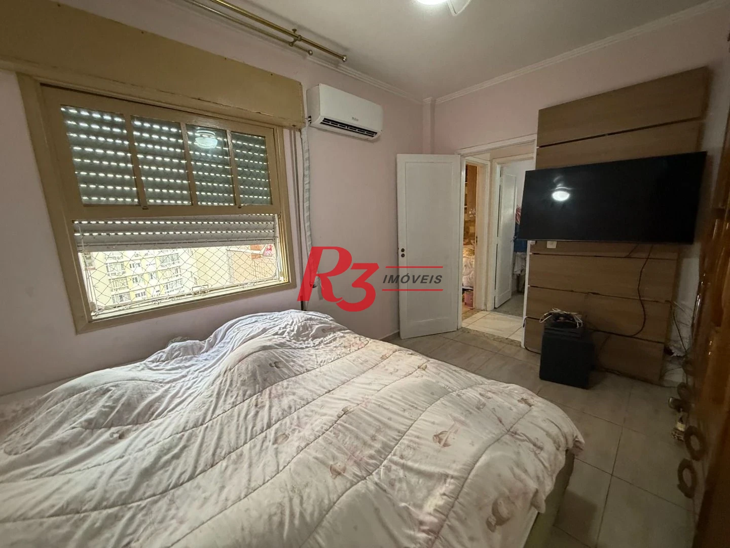 Apartamento com 2 dormitórios à venda, 127 m² por R$ 700.000,00 - Gonzaga - Santos/SP