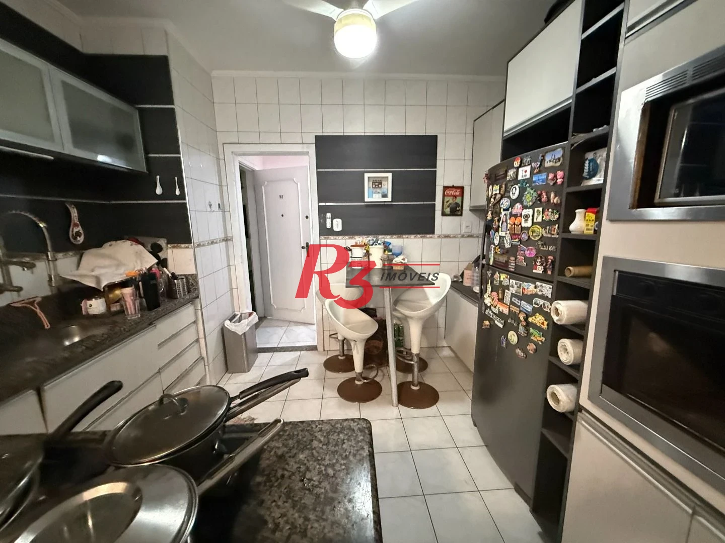 Apartamento com 2 dormitórios à venda, 127 m² por R$ 700.000,00 - Gonzaga - Santos/SP