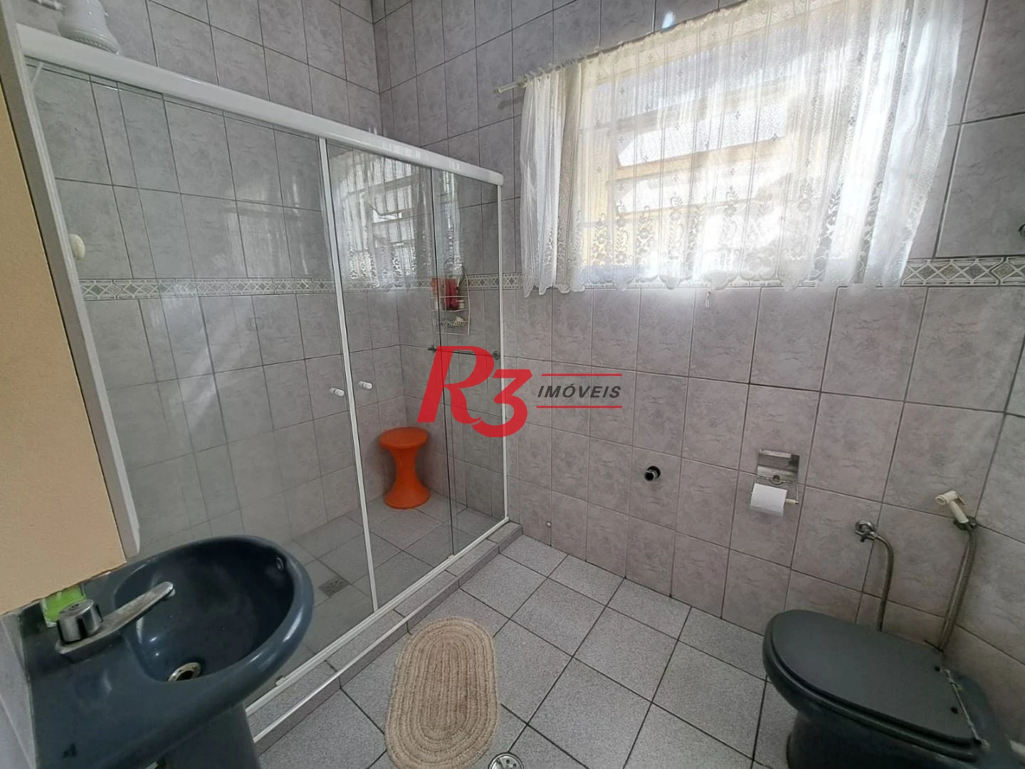 Sobrado com 3 dormitórios à venda, 167 m² por R$ 700.000,00 - Vila Matias - Santos/SP