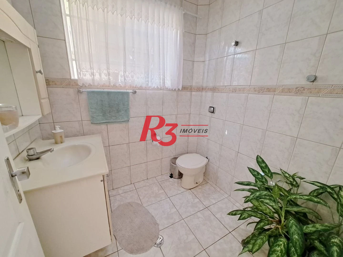 Sobrado com 3 dormitórios à venda, 167 m² por R$ 700.000,00 - Vila Matias - Santos/SP