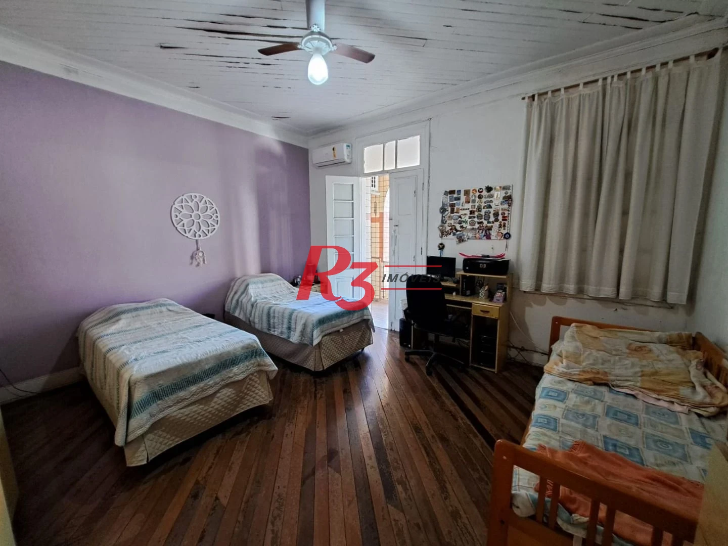 Sobrado com 3 dormitórios à venda, 167 m² por R$ 700.000,00 - Vila Matias - Santos/SP