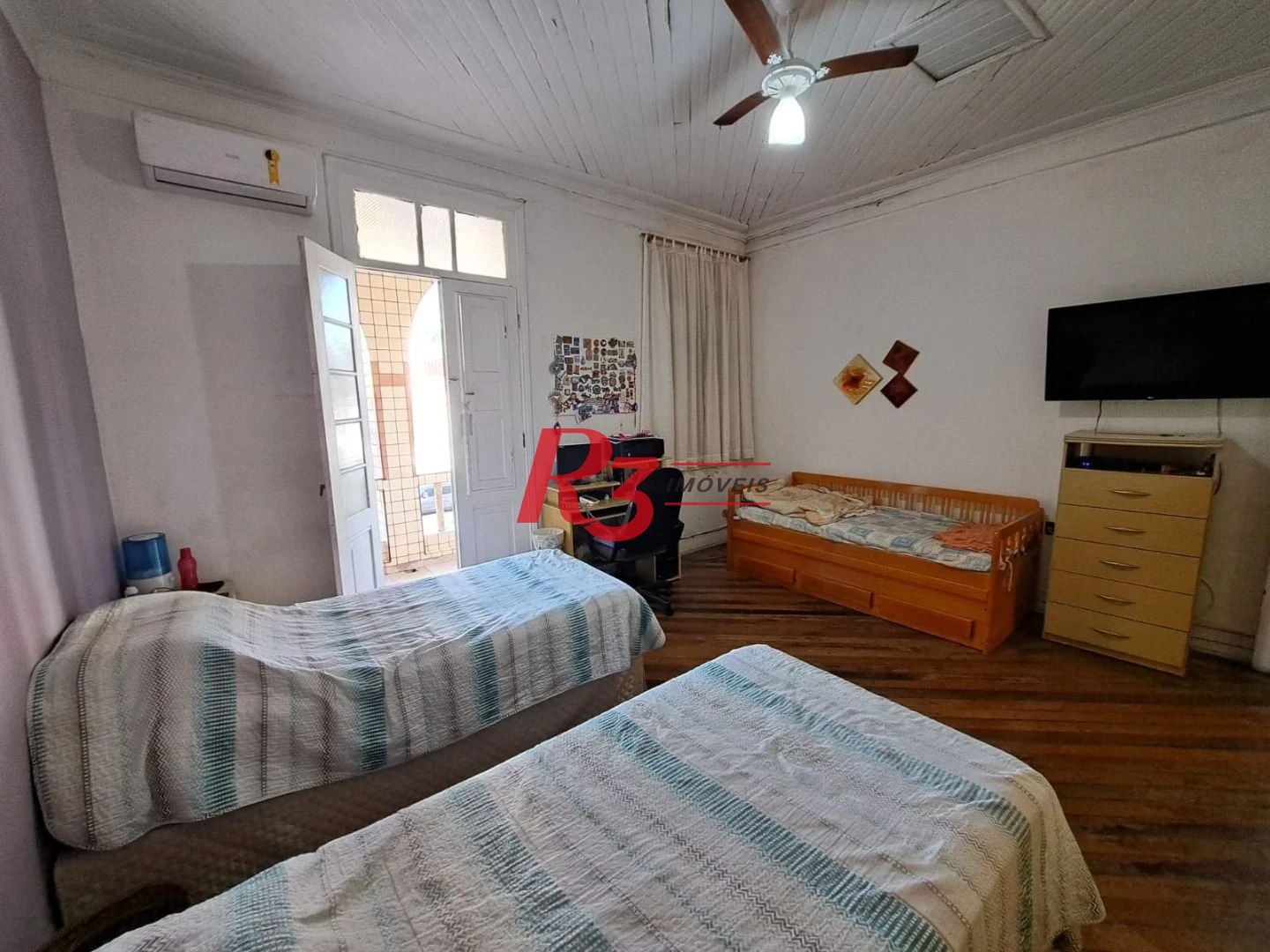 Sobrado com 3 dormitórios à venda, 167 m² por R$ 700.000,00 - Vila Matias - Santos/SP
