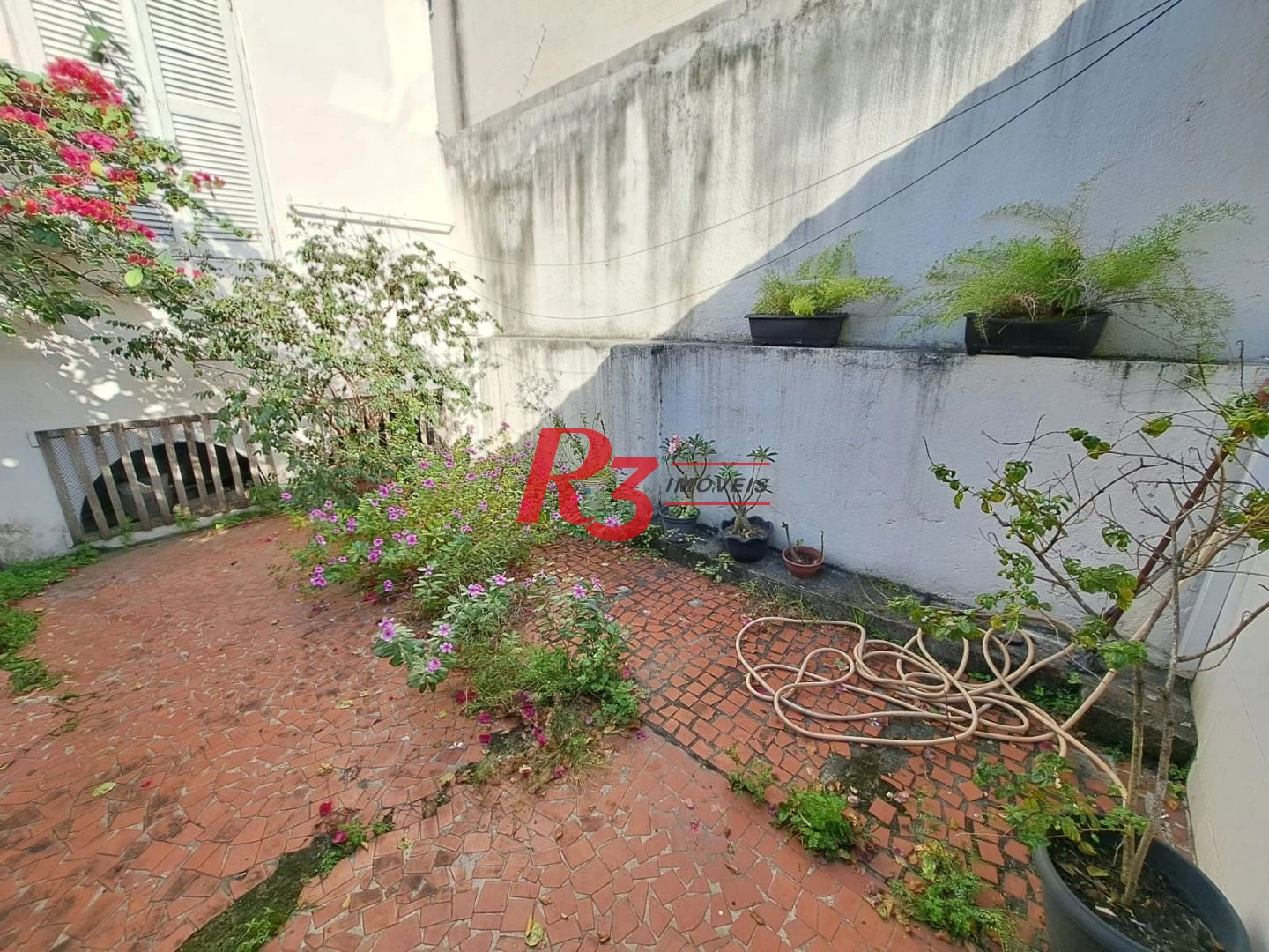 Sobrado com 3 dormitórios à venda, 167 m² por R$ 700.000,00 - Vila Matias - Santos/SP