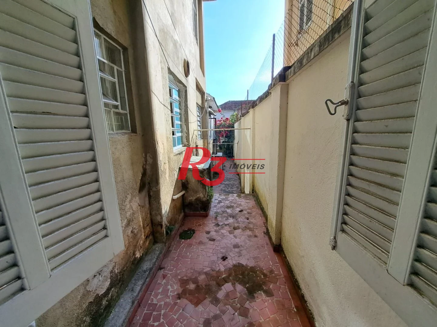 Sobrado com 3 dormitórios à venda, 167 m² por R$ 700.000,00 - Vila Matias - Santos/SP