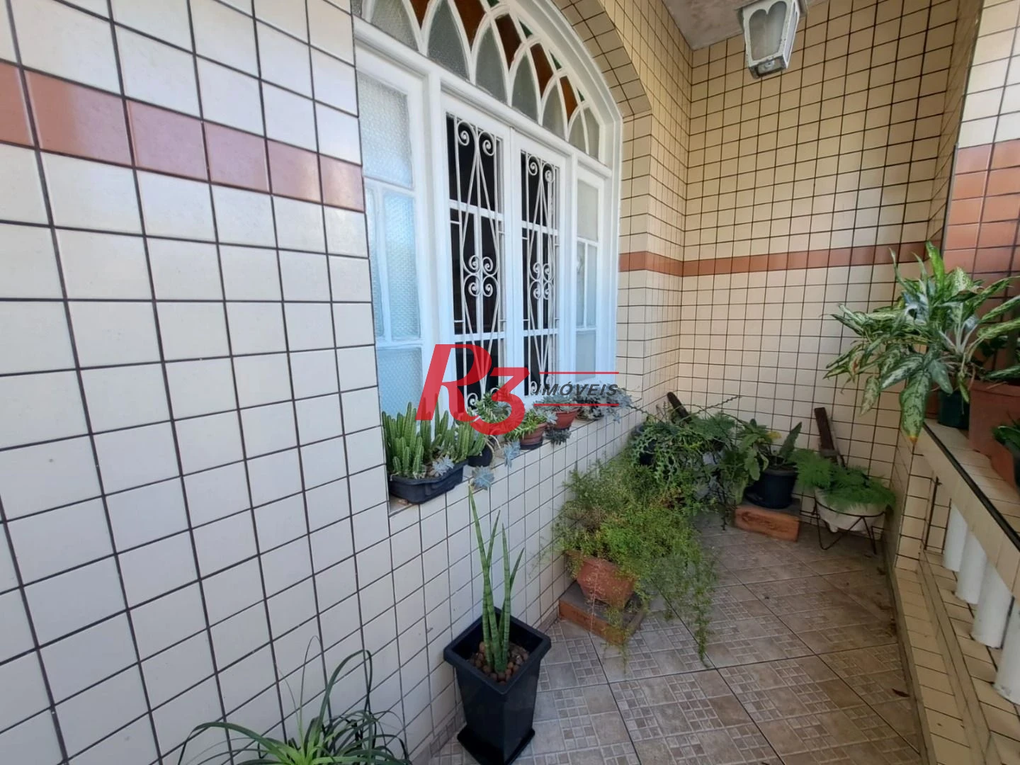 Sobrado com 3 dormitórios à venda, 167 m² por R$ 700.000,00 - Vila Matias - Santos/SP