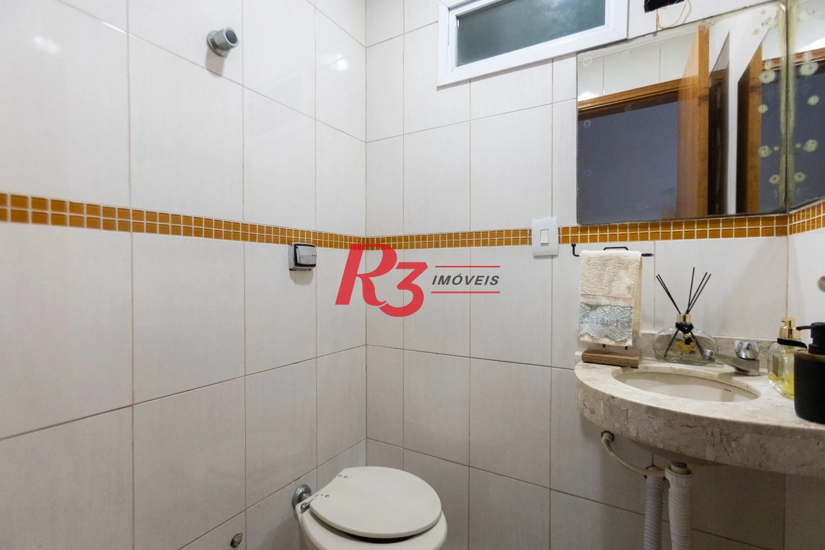 Casa com 3 dormitórios à venda, 275 m² por R$ 1.500.000,00 - Macuco - Santos/SP