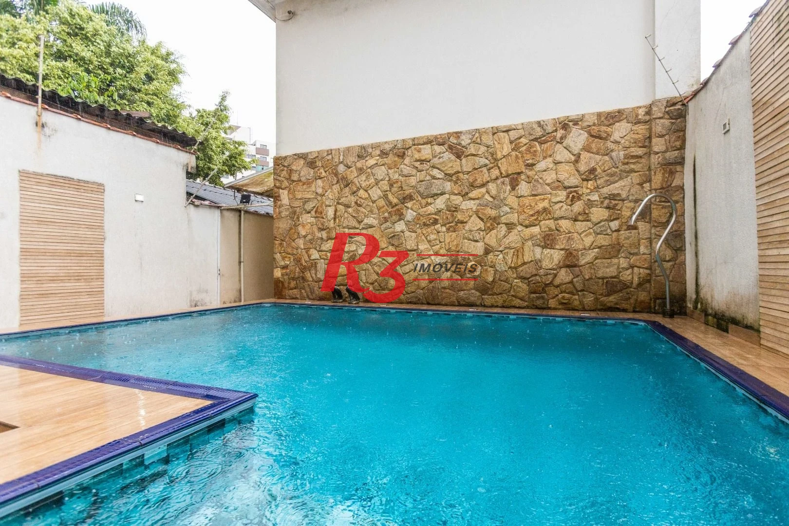Casa com 3 dormitórios à venda, 275 m² por R$ 1.500.000,00 - Macuco - Santos/SP