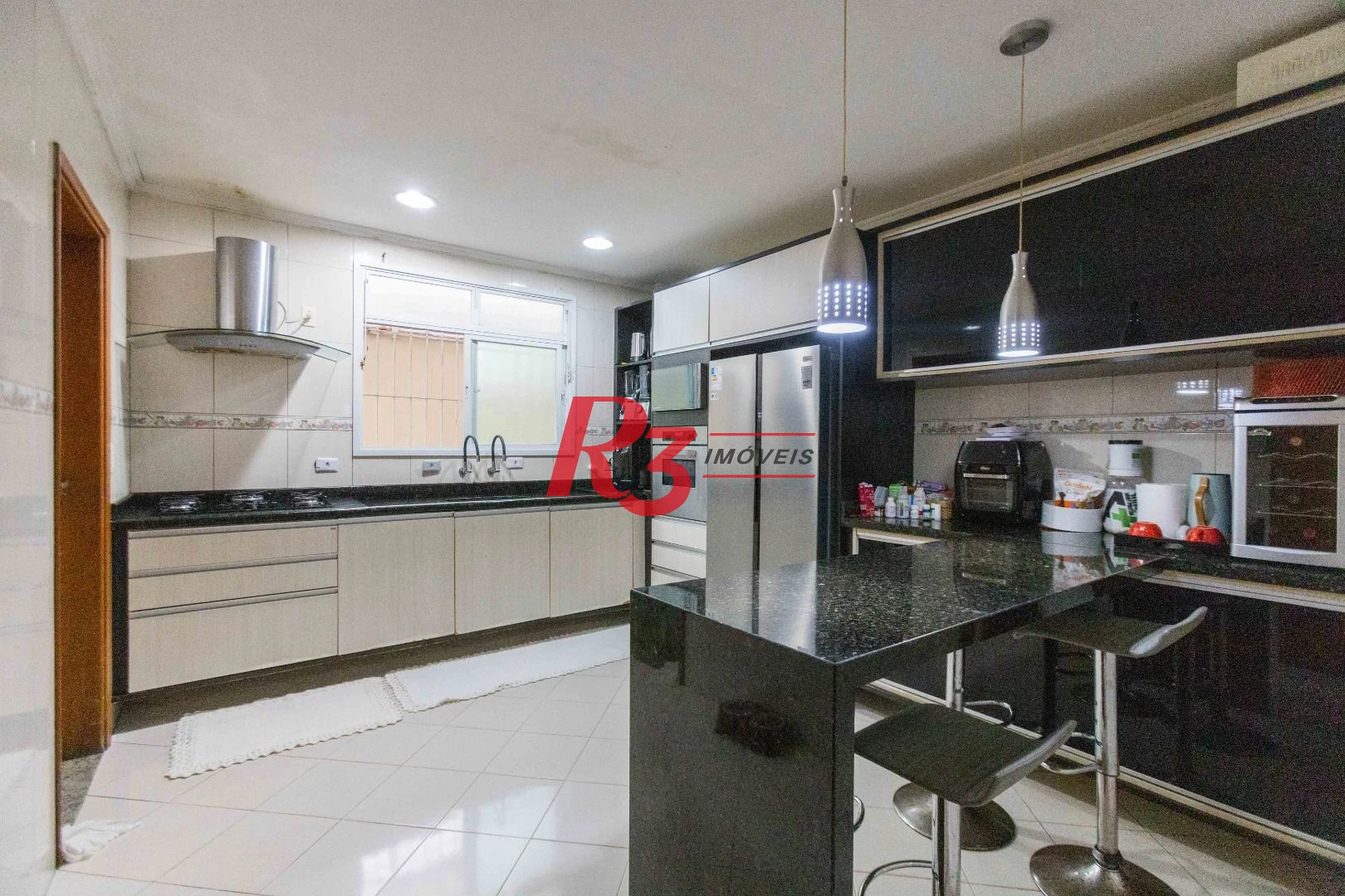 Casa com 3 dormitórios à venda, 275 m² por R$ 1.500.000,00 - Macuco - Santos/SP