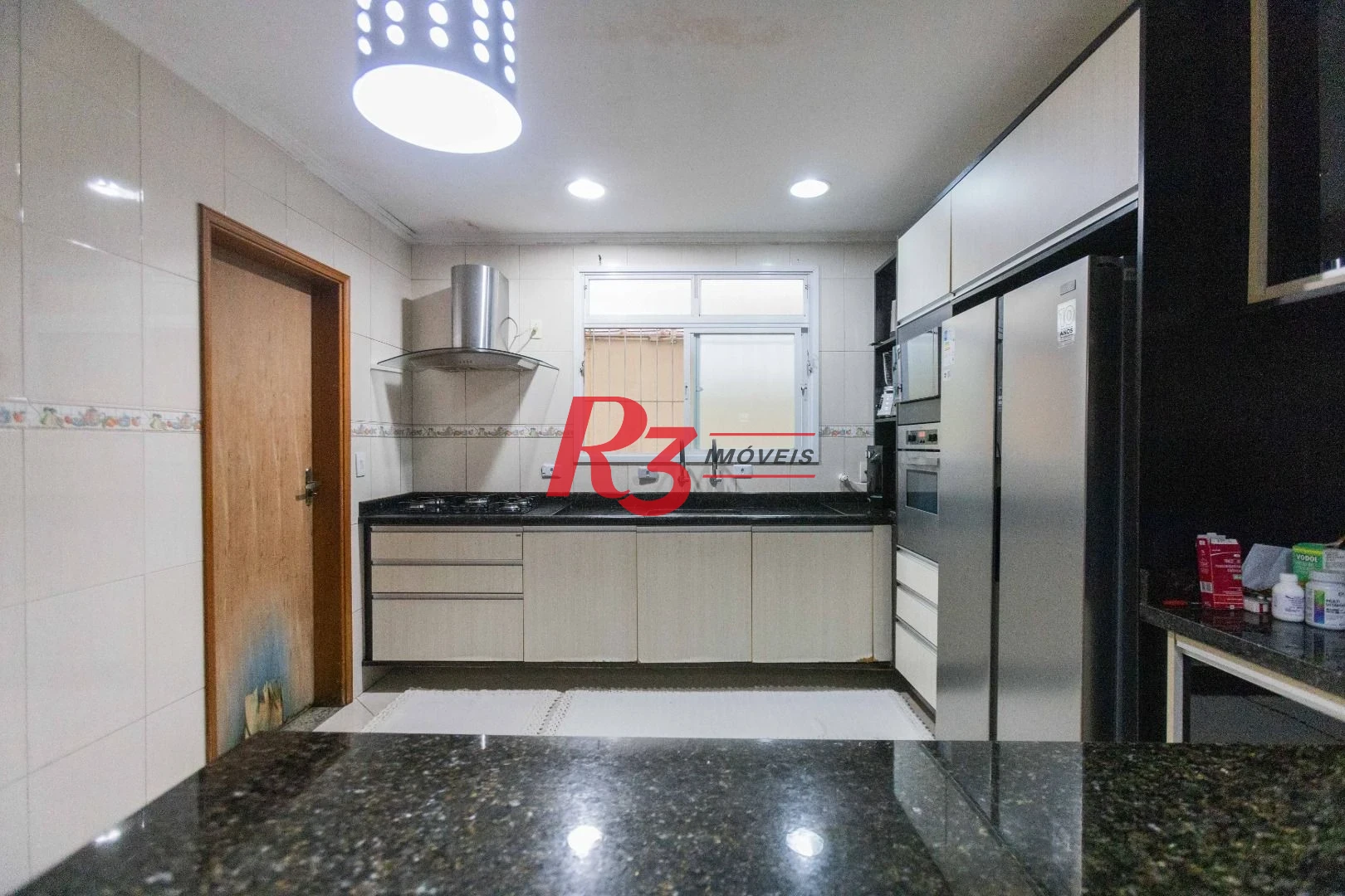 Casa com 3 dormitórios à venda, 275 m² por R$ 1.500.000,00 - Macuco - Santos/SP