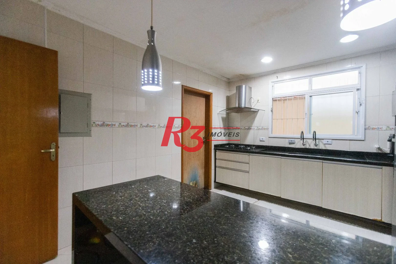 Casa com 3 dormitórios à venda, 275 m² por R$ 1.500.000,00 - Macuco - Santos/SP