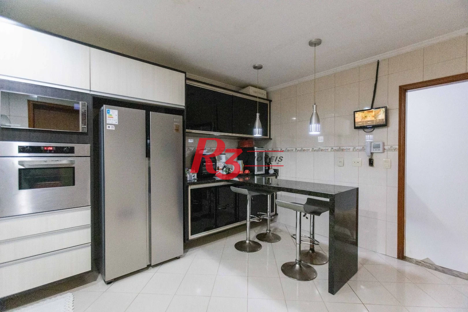 Casa com 3 dormitórios à venda, 275 m² por R$ 1.500.000,00 - Macuco - Santos/SP