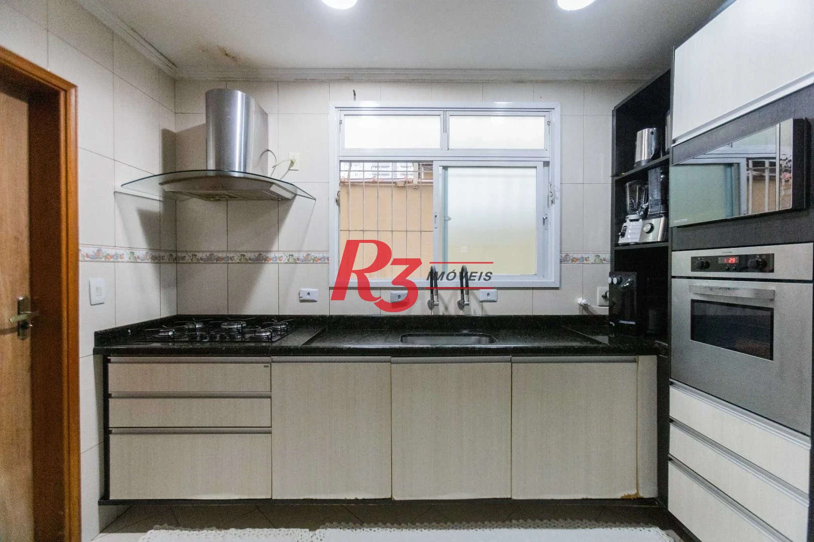 Casa com 3 dormitórios à venda, 275 m² por R$ 1.500.000,00 - Macuco - Santos/SP