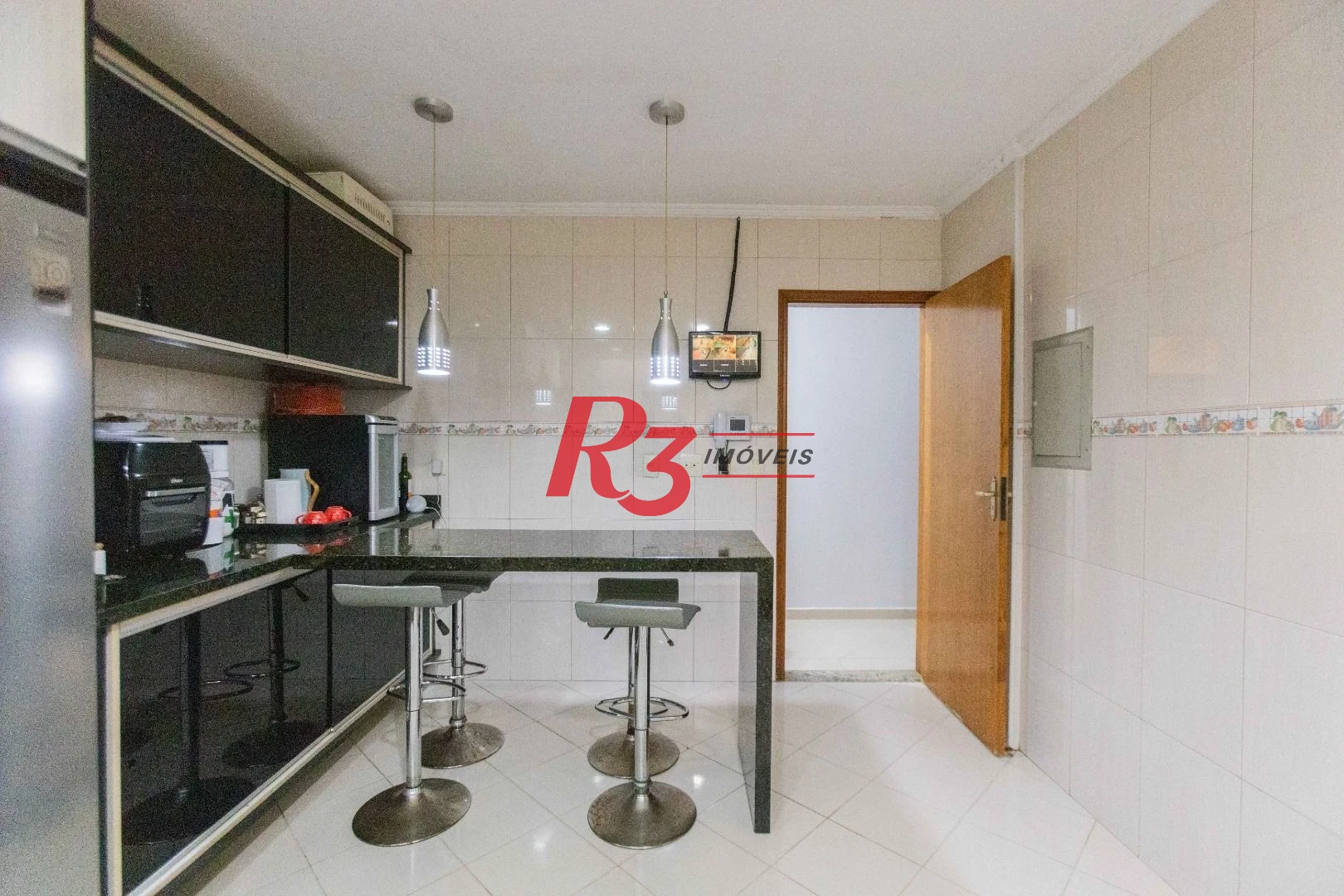 Casa com 3 dormitórios à venda, 275 m² por R$ 1.500.000,00 - Macuco - Santos/SP