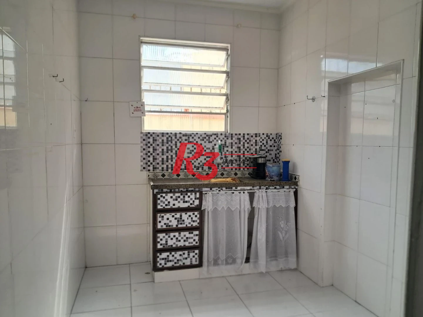 Apartamento com 2 dormitórios à venda, 67 m² por R$ 410.000,00 - Marapé - Santos/SP