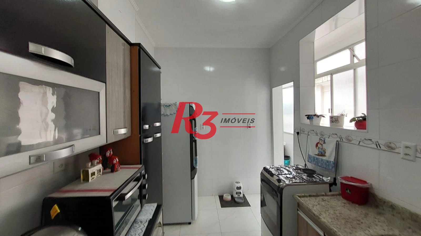 Apartamento com 3 dormitórios à venda, 89 m² por R$ 590.000,00 - José Menino - Santos/SP
