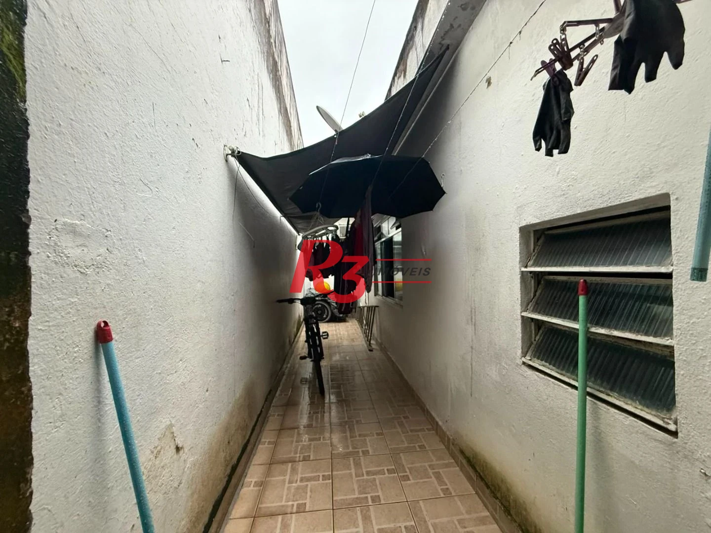 Prédio à venda, 326 m² por R$ 1.300.000,00 - Paquetá - Santos/SP