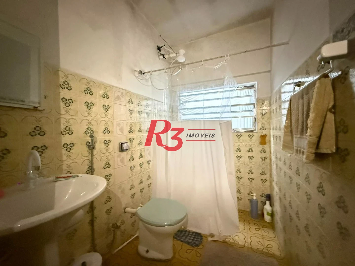 Prédio à venda, 326 m² por R$ 1.300.000,00 - Paquetá - Santos/SP