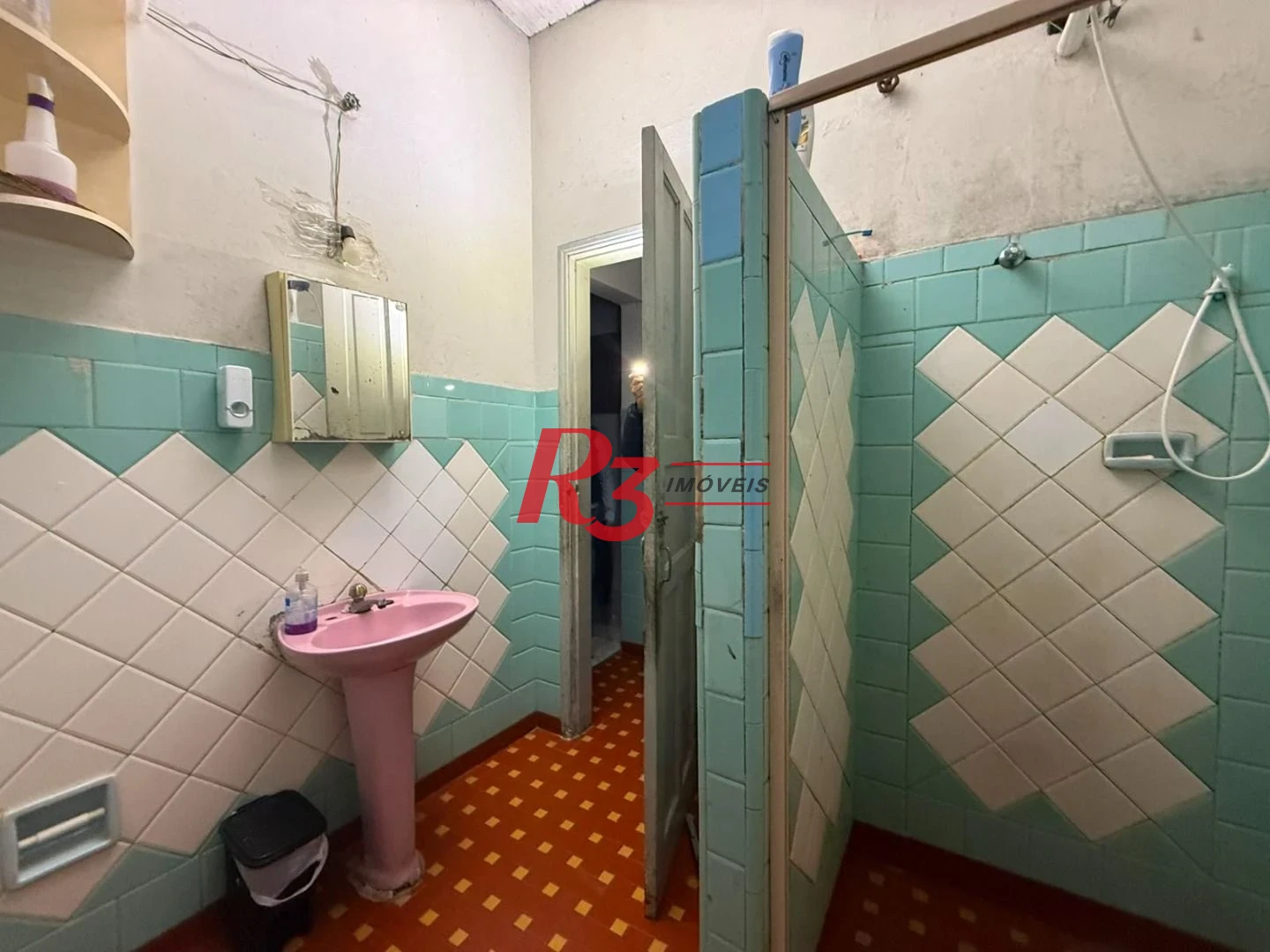 Prédio à venda, 326 m² por R$ 1.300.000,00 - Paquetá - Santos/SP