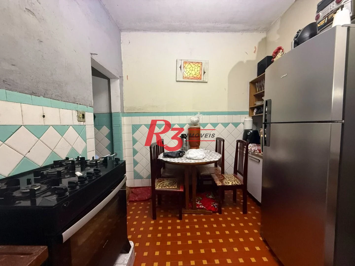 Prédio à venda, 326 m² por R$ 1.300.000,00 - Paquetá - Santos/SP