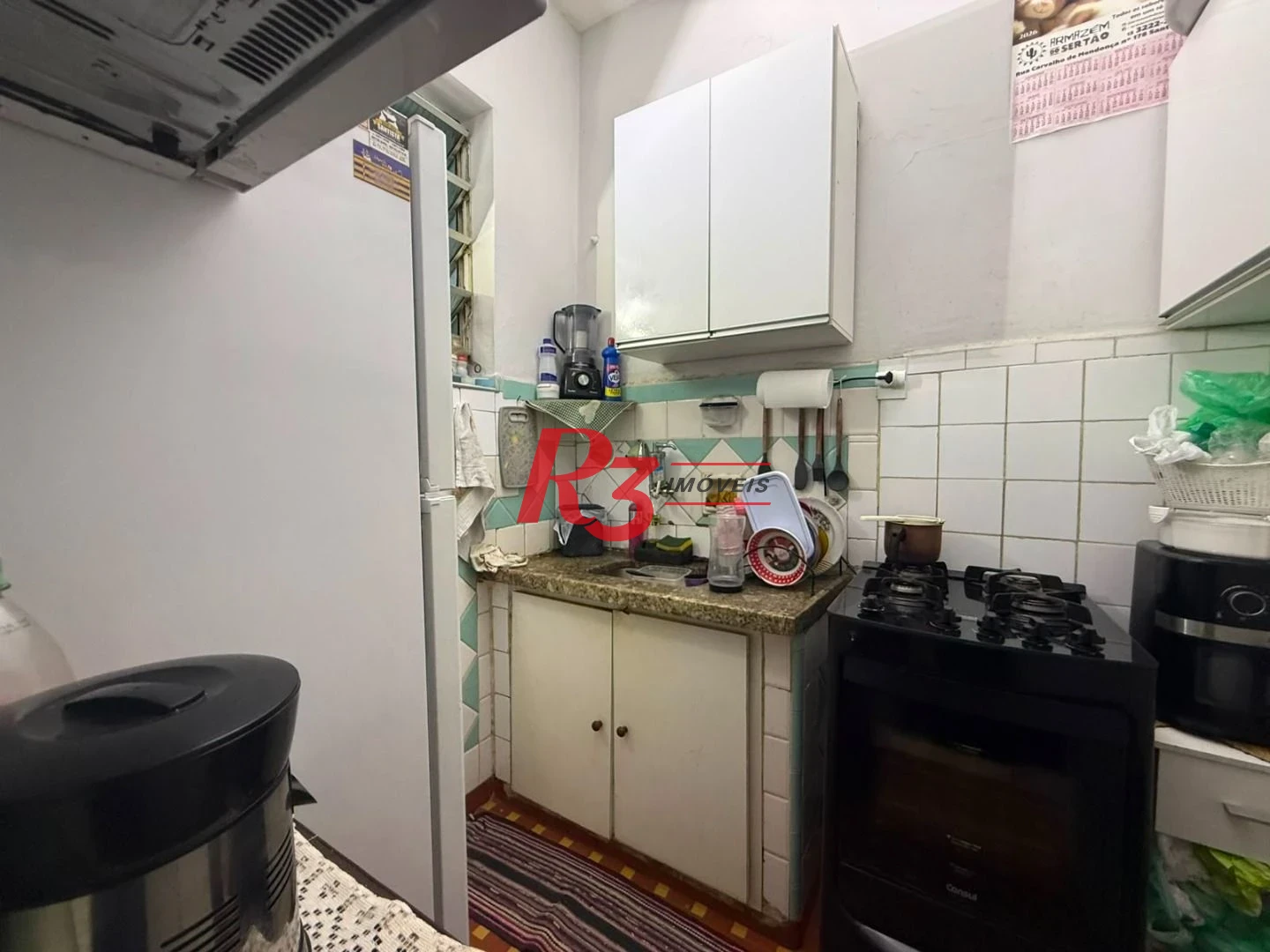 Prédio à venda, 326 m² por R$ 1.300.000,00 - Paquetá - Santos/SP