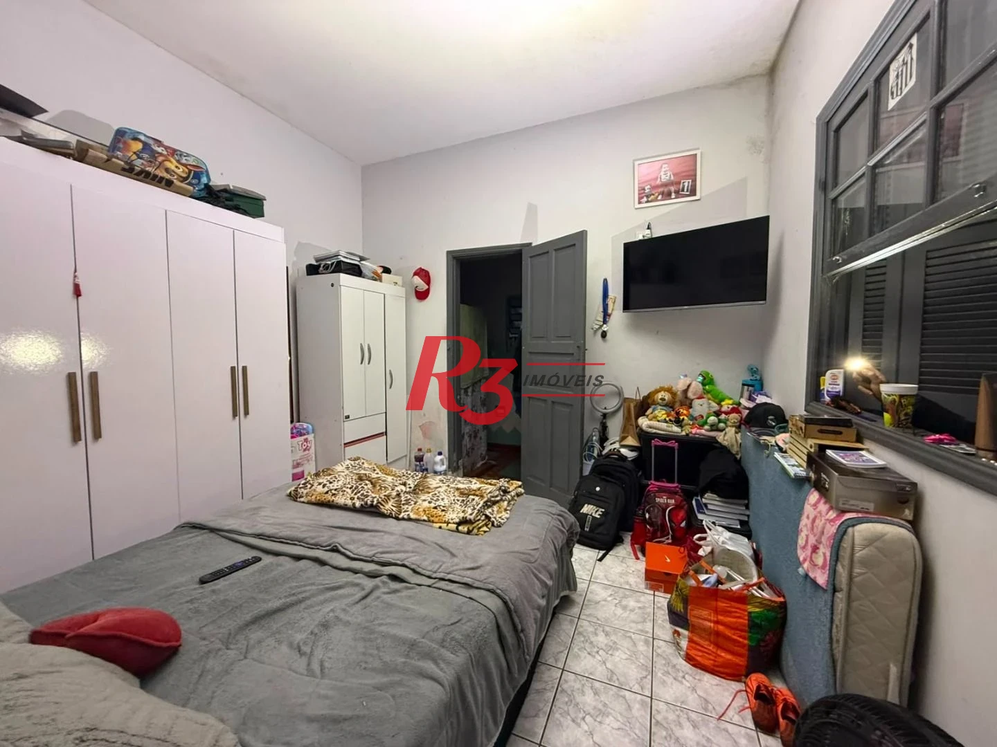 Prédio à venda, 326 m² por R$ 1.300.000,00 - Paquetá - Santos/SP