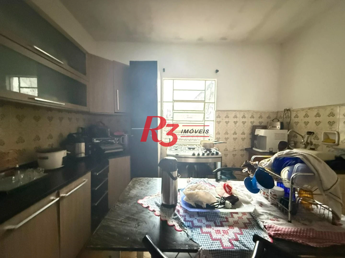 Prédio à venda, 326 m² por R$ 1.300.000,00 - Paquetá - Santos/SP