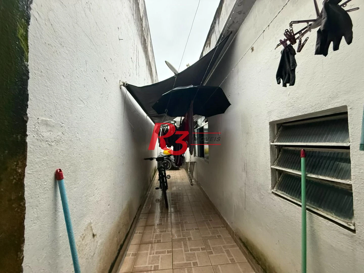 Prédio à venda, 326 m² por R$ 1.300.000,00 - Paquetá - Santos/SP
