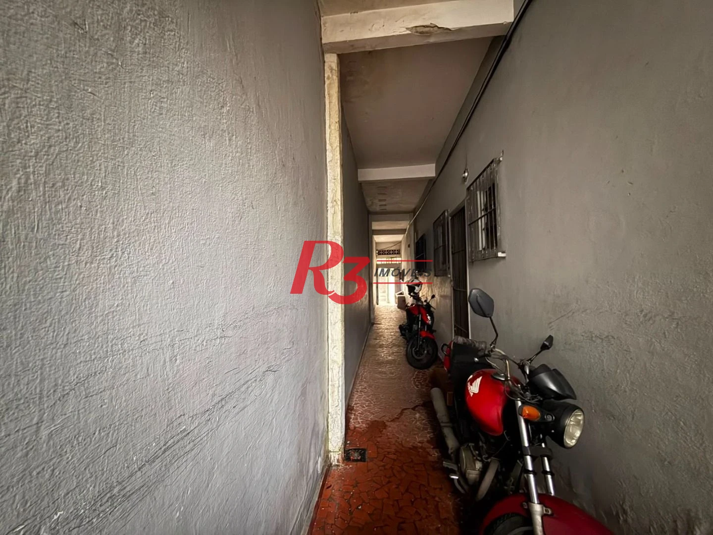 Prédio à venda, 326 m² por R$ 1.300.000,00 - Paquetá - Santos/SP