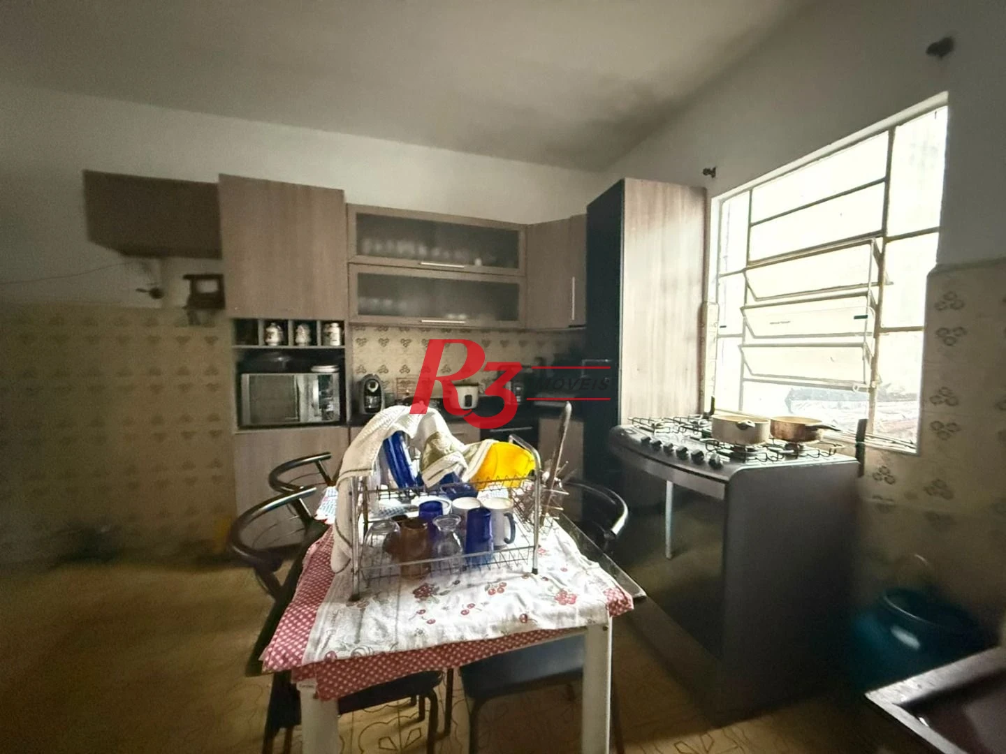 Prédio à venda, 326 m² por R$ 1.300.000,00 - Paquetá - Santos/SP
