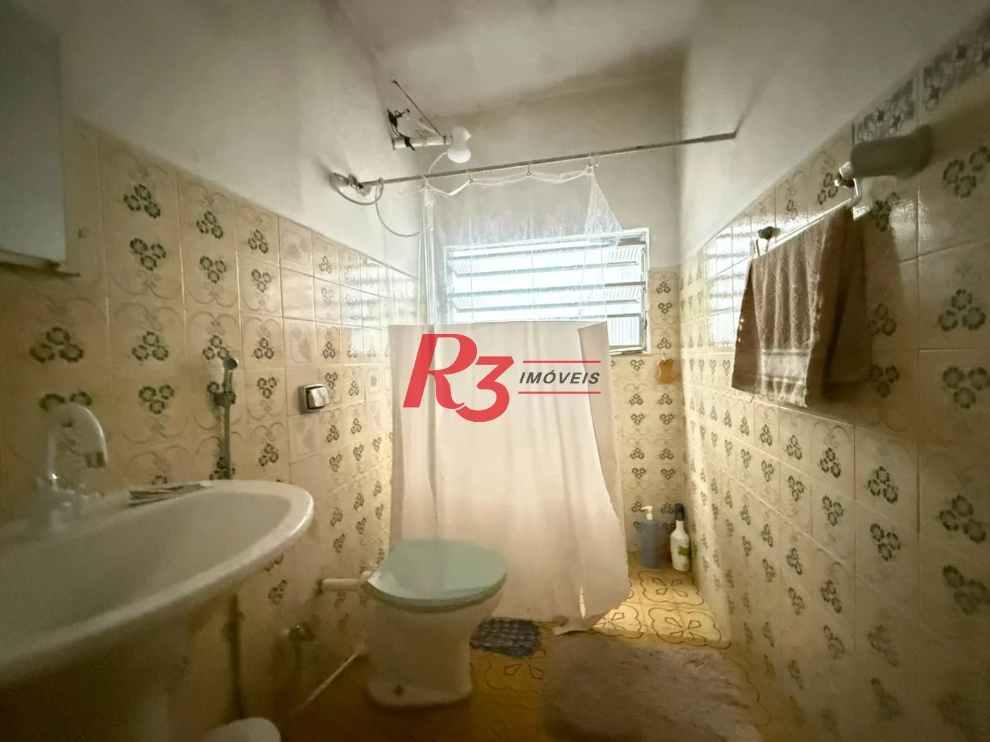 Prédio à venda, 326 m² por R$ 1.300.000,00 - Paquetá - Santos/SP
