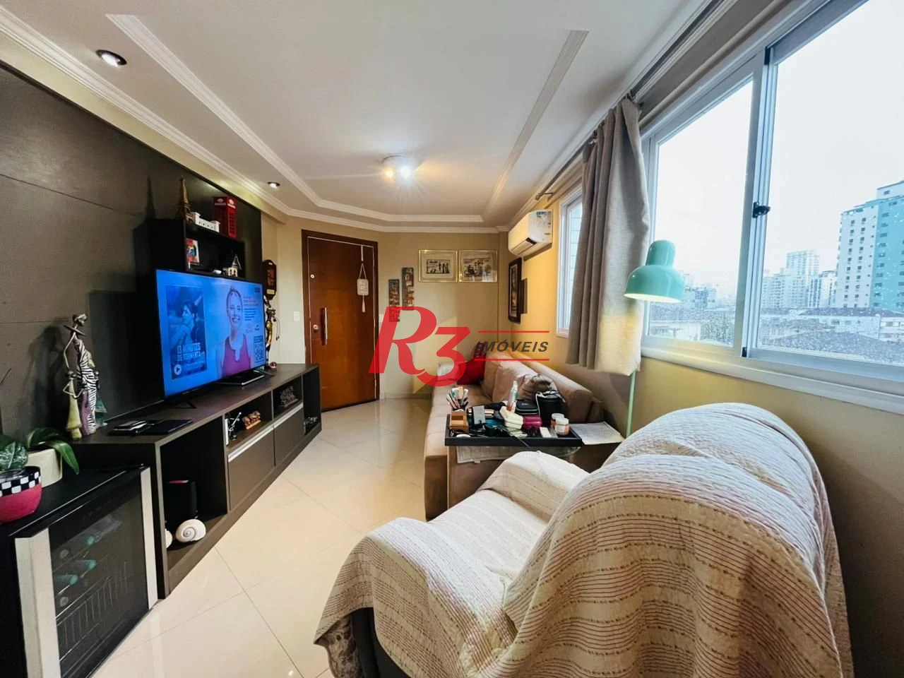 Apartamento Triplex com 2 dormitórios à venda, 121 m² por R$ 775.000,00 - Embaré - Santos/SP