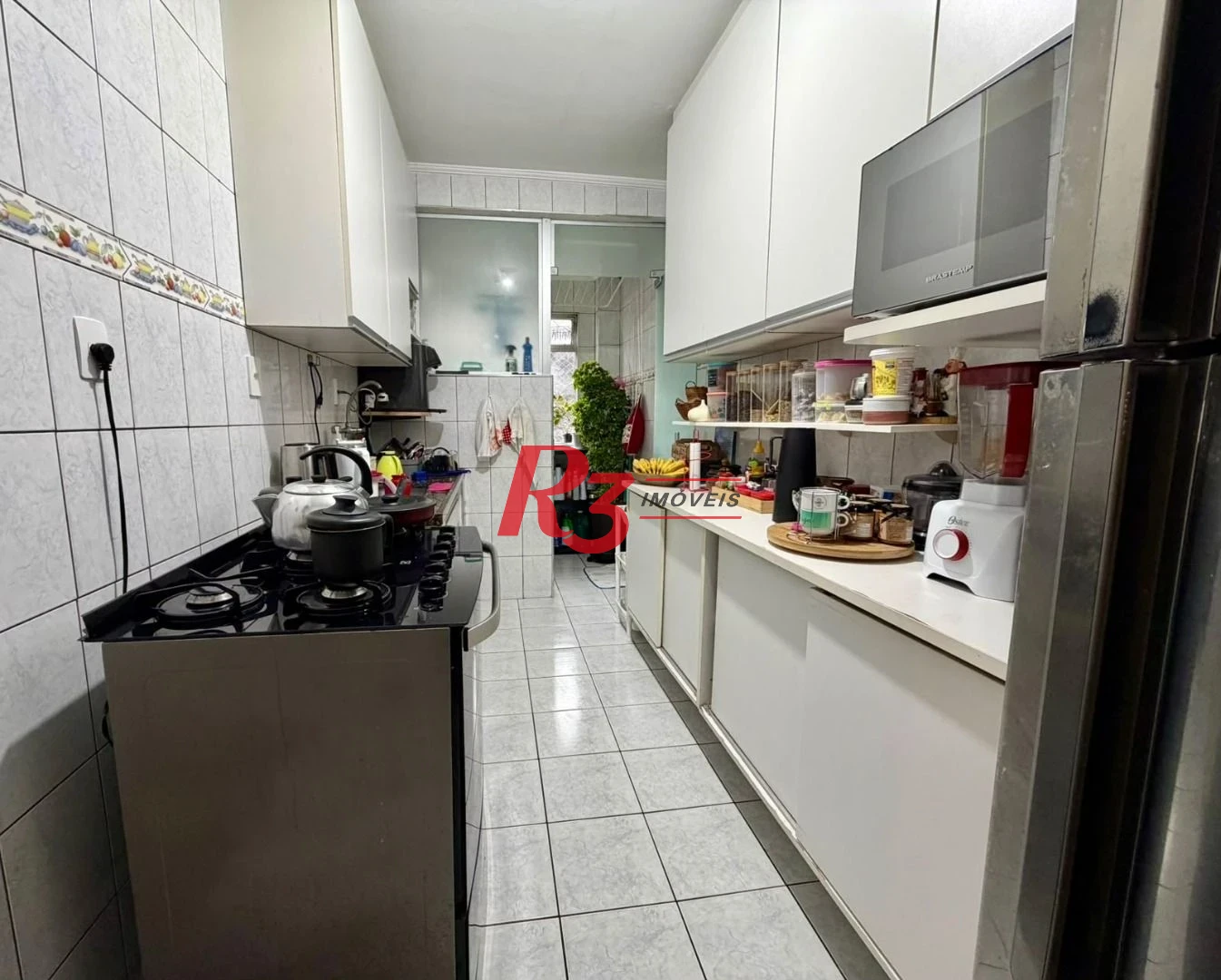 Apartamento com 2 dormitórios à venda, 65 m² por R$ 329.000,00 - Vila Mathias - Santos/SP