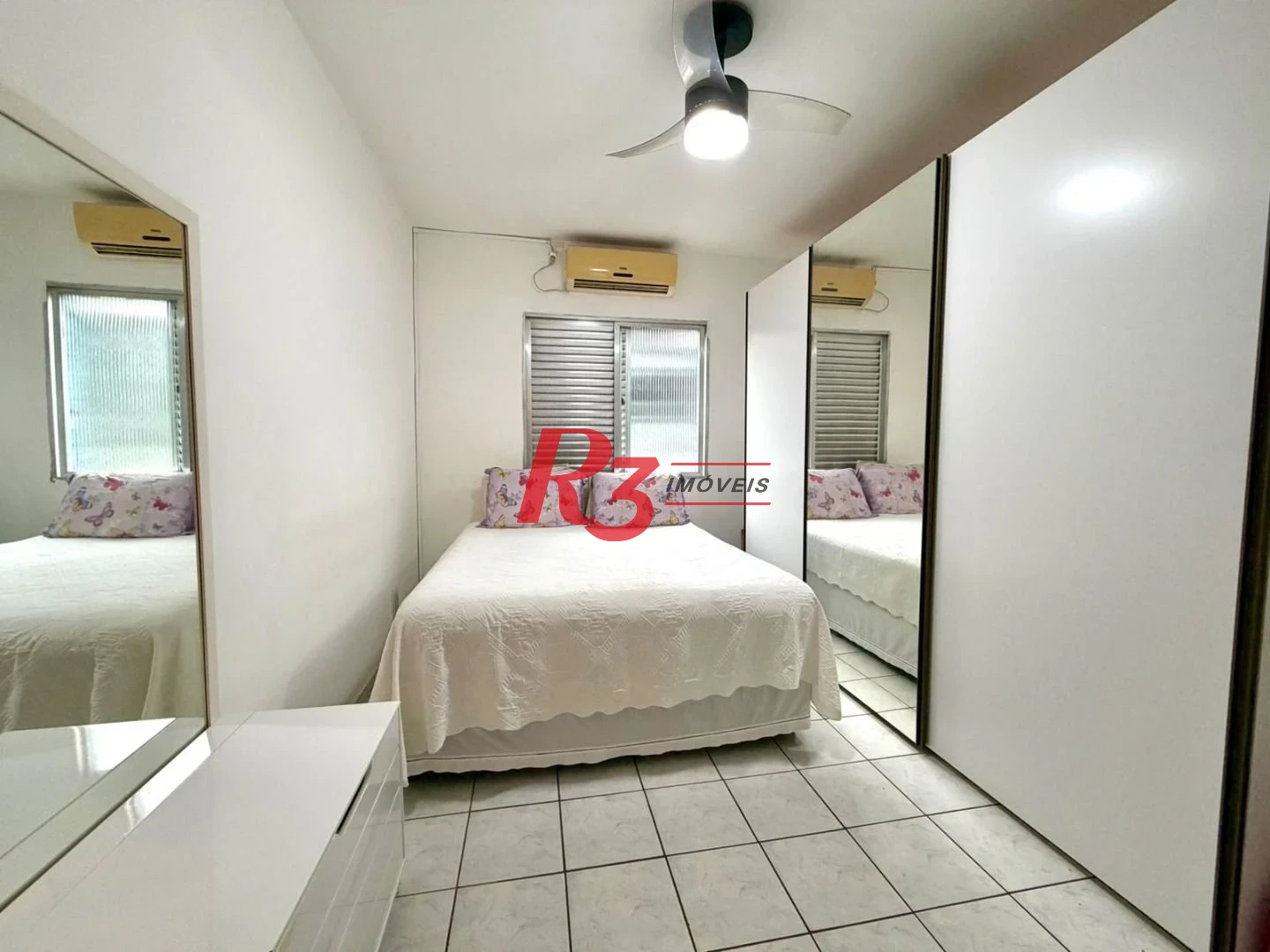 Apartamento com 2 dormitórios à venda, 65 m² por R$ 329.000,00 - Vila Mathias - Santos/SP