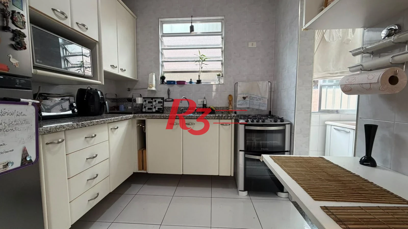 Apartamento com 2 dormitórios à venda, 70 m² por R$ 465.000,00 - Gonzaga - Santos/SP