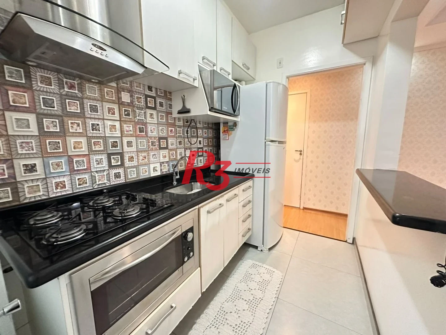 Apartamento com 3 dormitórios à venda, 69 m² por R$ 430.000,00 - Areia Branca - Santos/SP