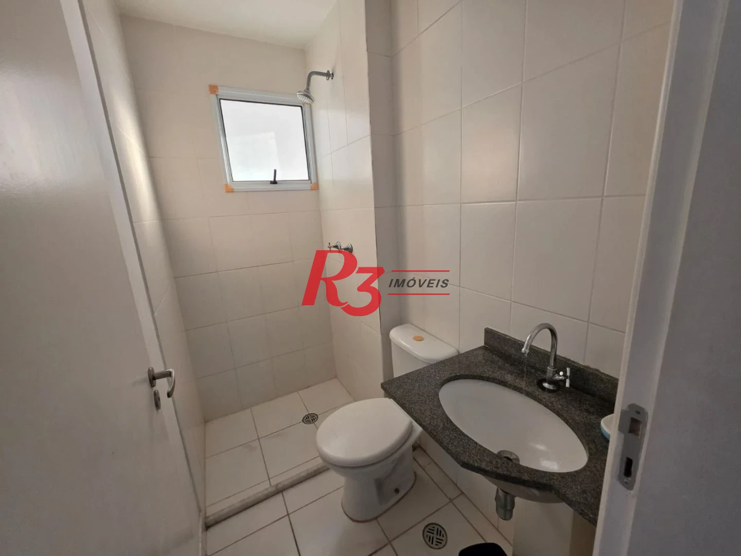 Apartamento com 3 dormitórios à venda, 69 m² por R$ 395.000,00 - Areia Branca - Santos/SP