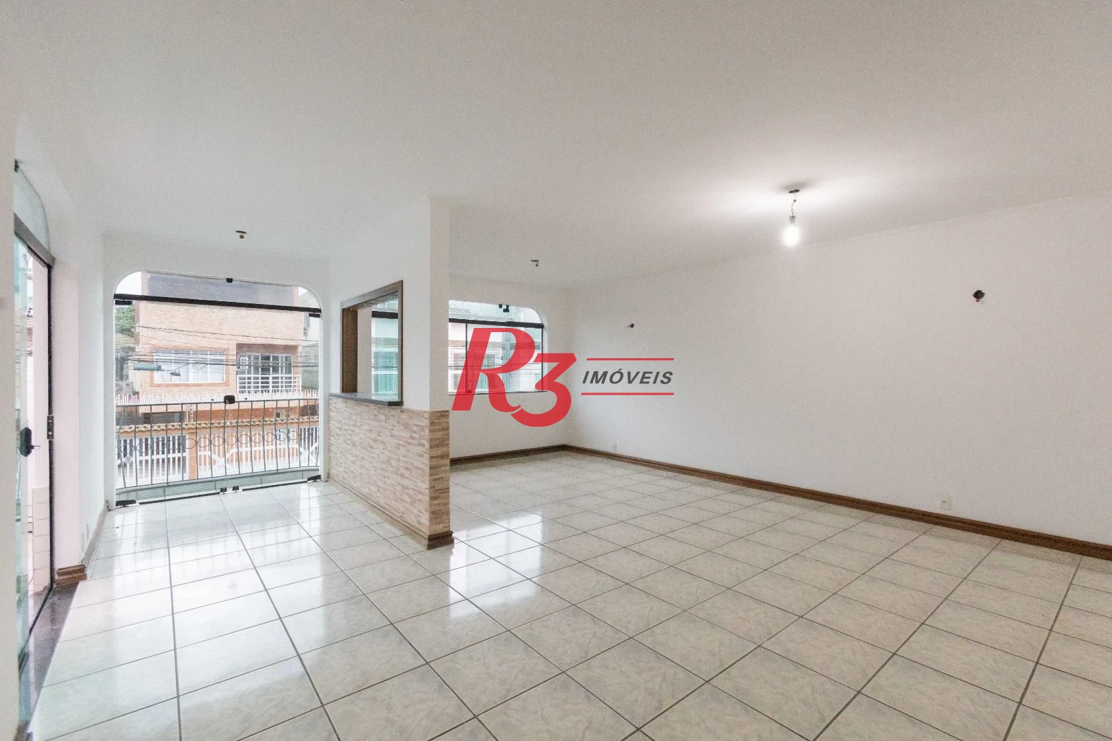 Casa com 3 dormitórios à venda, 164 m² por R$ 1.090.000,00 - Ponta da Praia - Santos/SP
