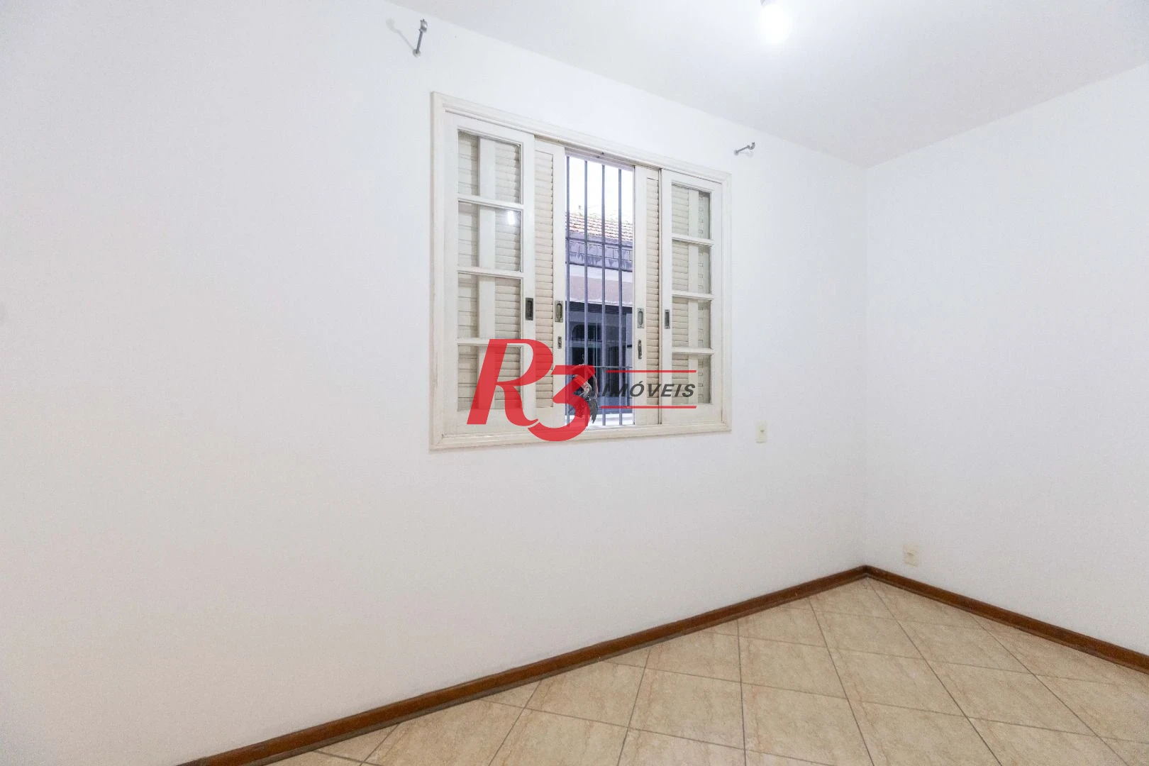 Casa com 3 dormitórios à venda, 164 m² por R$ 1.090.000,00 - Ponta da Praia - Santos/SP