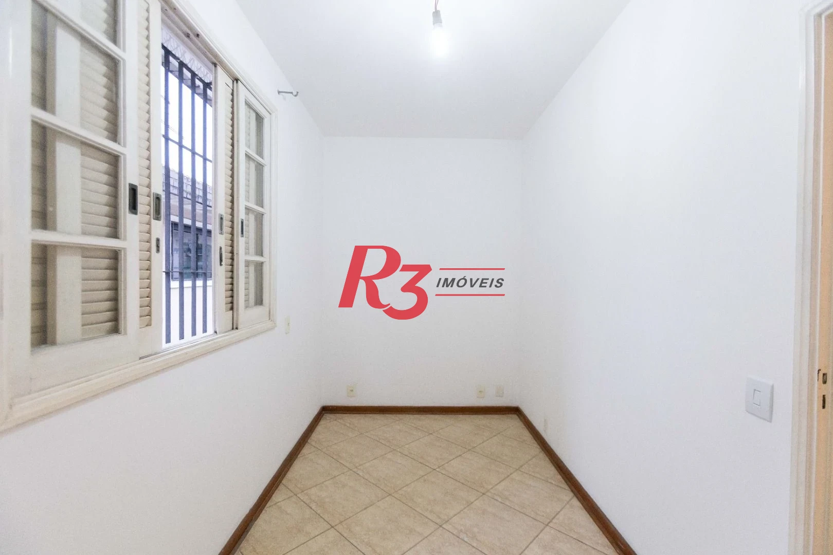 Casa com 3 dormitórios à venda, 164 m² por R$ 1.090.000,00 - Ponta da Praia - Santos/SP