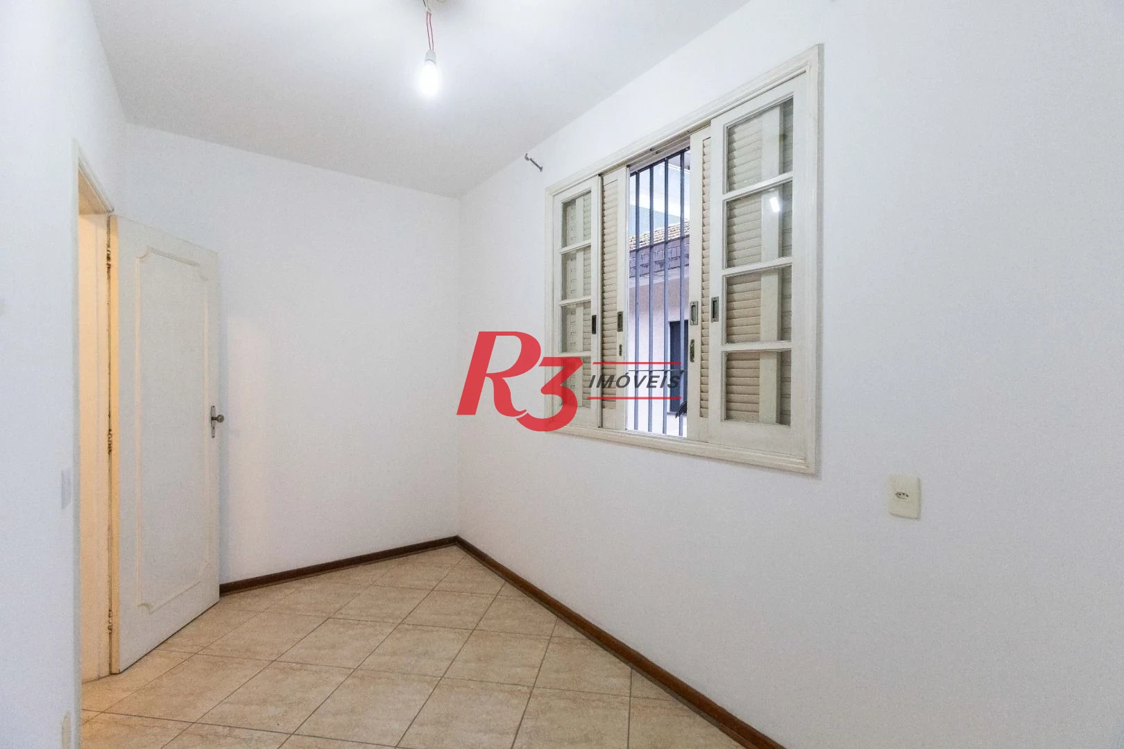 Casa com 3 dormitórios à venda, 164 m² por R$ 1.090.000,00 - Ponta da Praia - Santos/SP