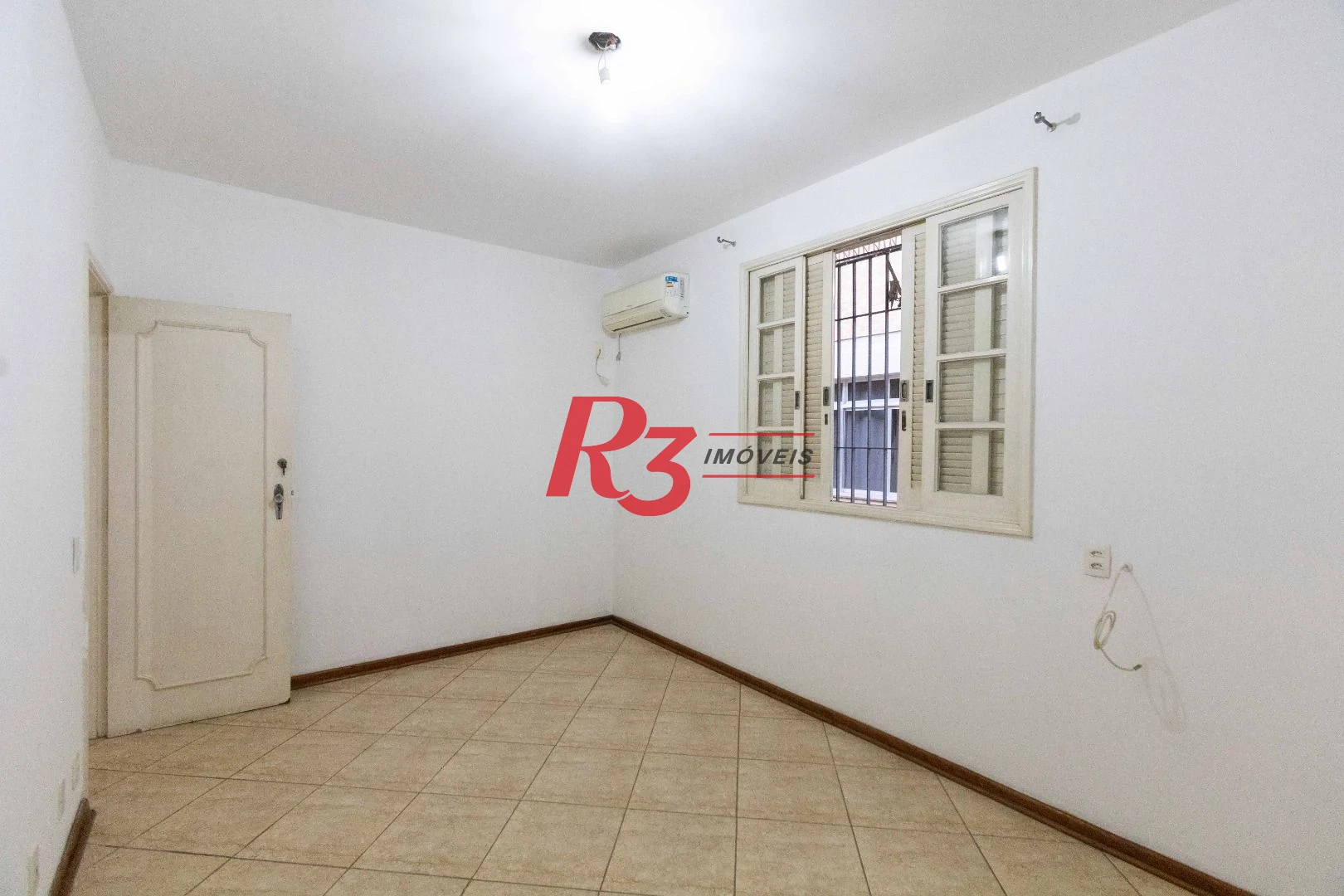 Casa com 3 dormitórios à venda, 164 m² por R$ 1.090.000,00 - Ponta da Praia - Santos/SP