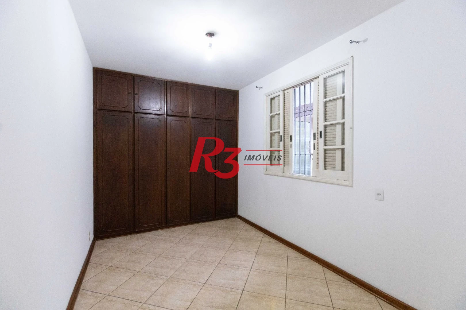 Casa com 3 dormitórios à venda, 164 m² por R$ 1.090.000,00 - Ponta da Praia - Santos/SP