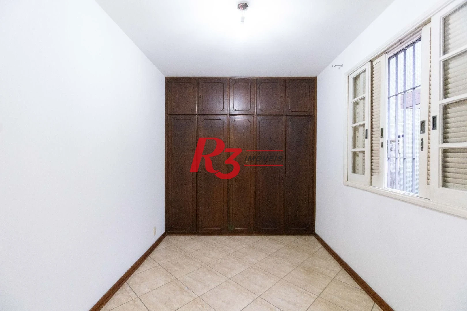Casa com 3 dormitórios à venda, 164 m² por R$ 1.090.000,00 - Ponta da Praia - Santos/SP