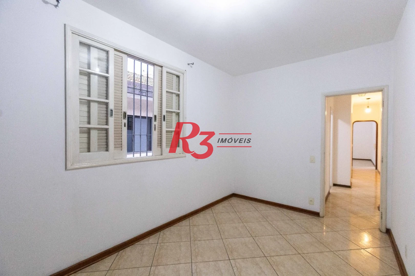 Casa com 3 dormitórios à venda, 164 m² por R$ 1.090.000,00 - Ponta da Praia - Santos/SP