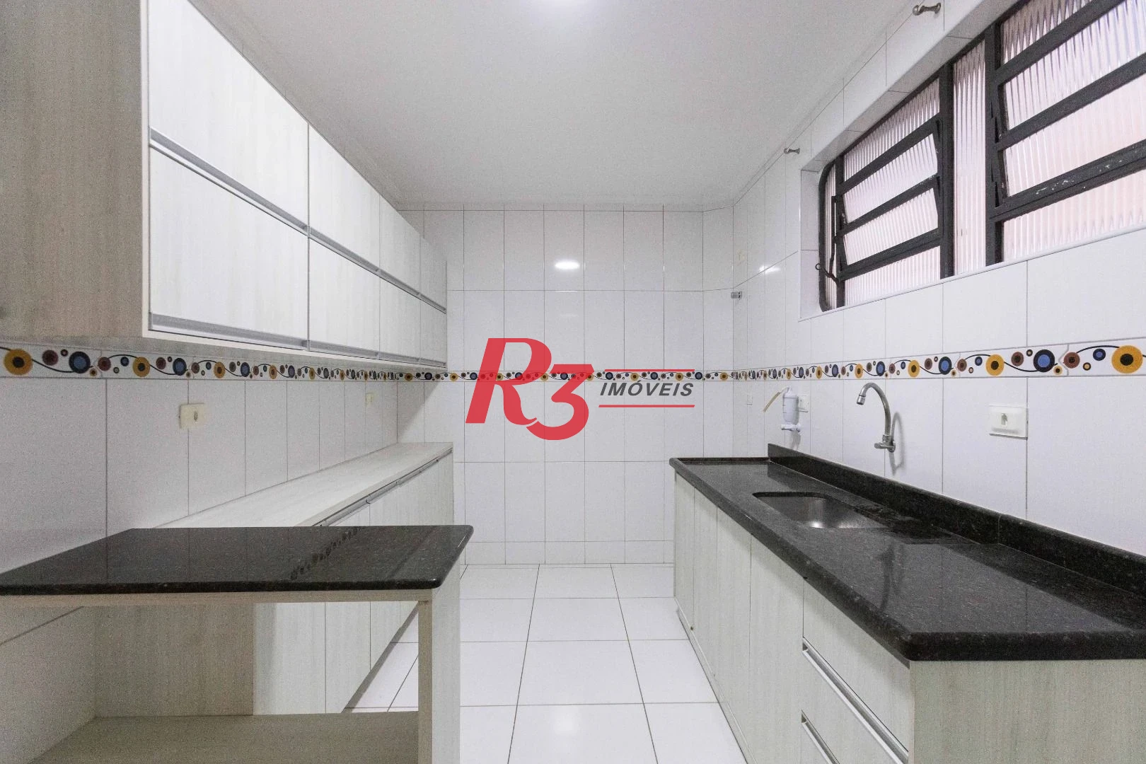 Casa com 3 dormitórios à venda, 164 m² por R$ 1.090.000,00 - Ponta da Praia - Santos/SP