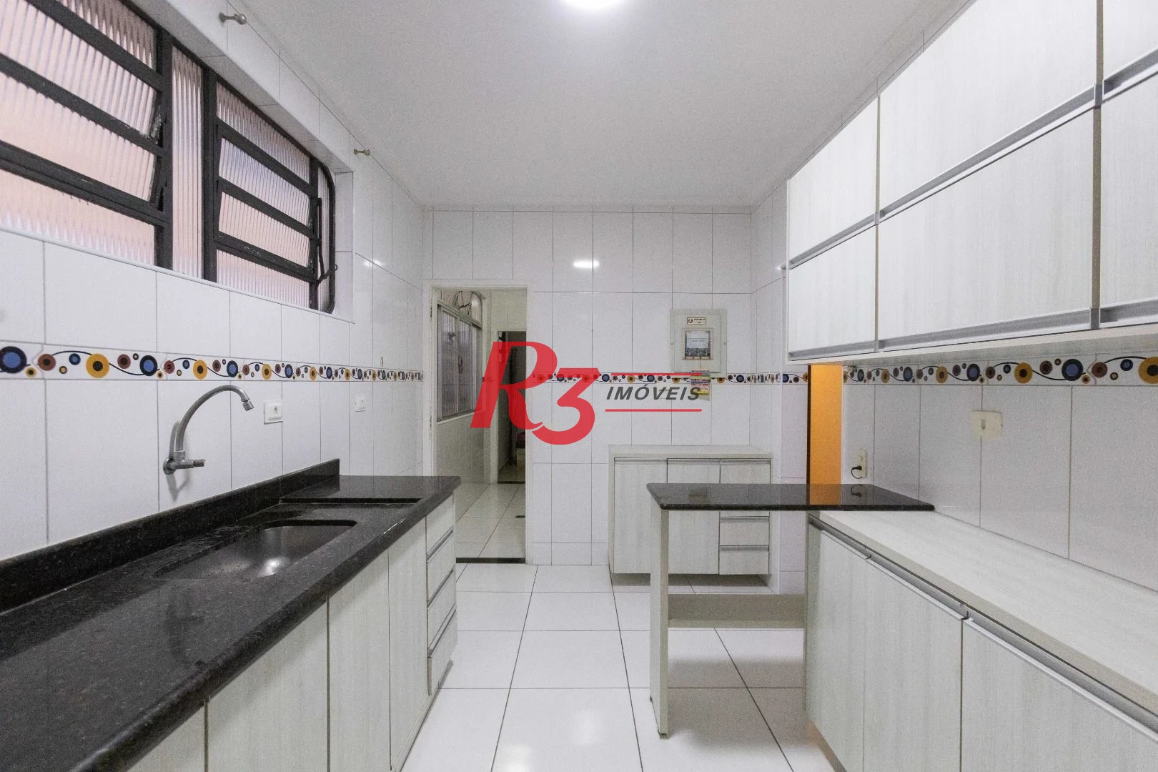 Casa com 3 dormitórios à venda, 164 m² por R$ 1.090.000,00 - Ponta da Praia - Santos/SP