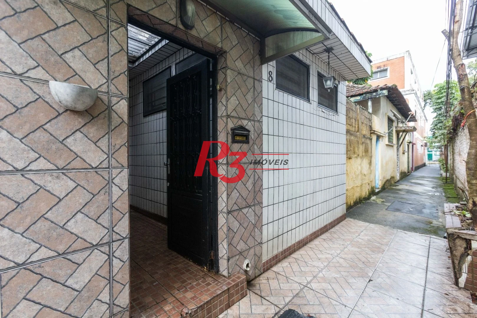 Casa com 2 dormitórios à venda, 64 m² por R$ 320.000,00 - Vila Marlthiaa - Santos/SP