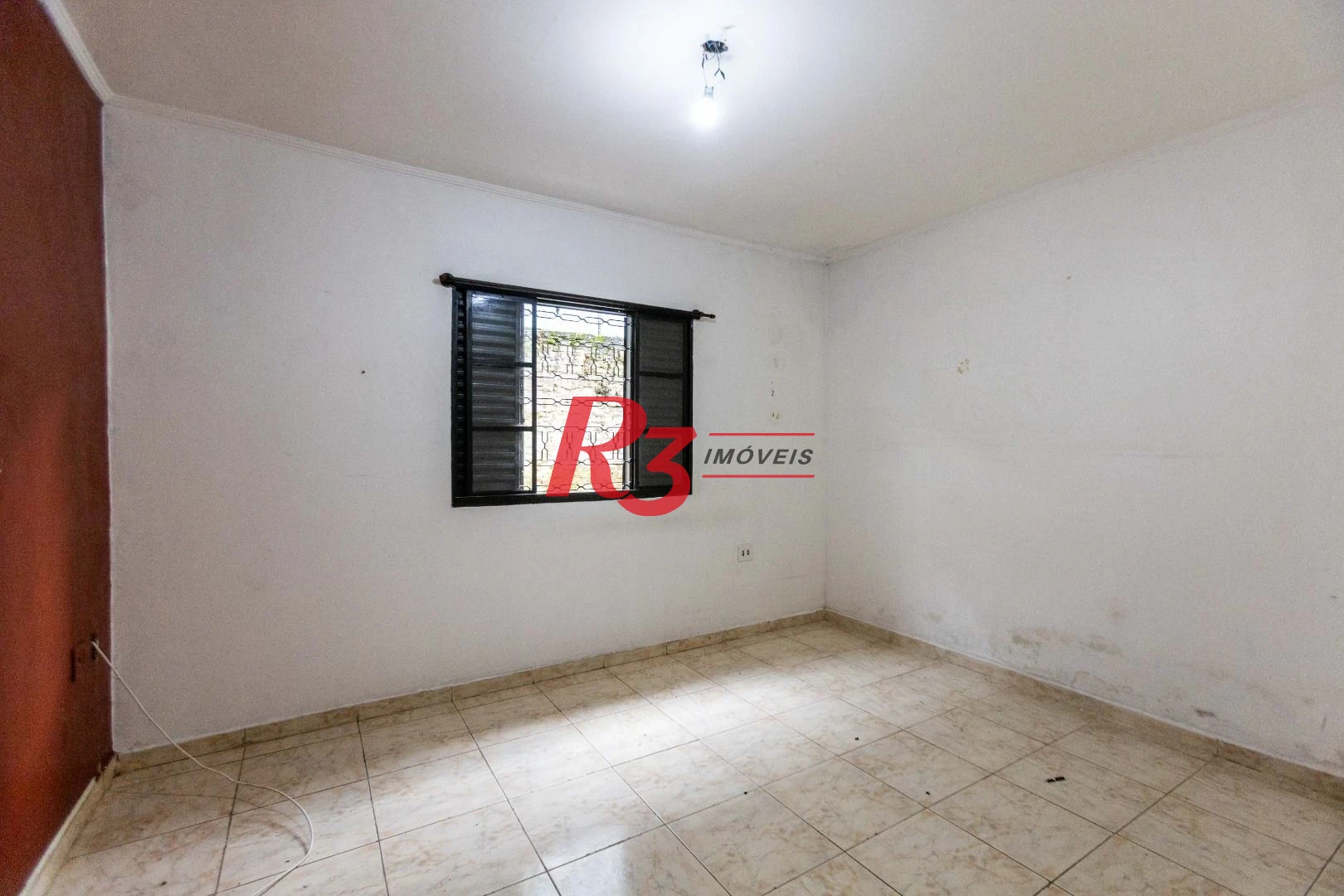 Casa com 2 dormitórios à venda, 64 m² por R$ 320.000,00 - Vila Marlthiaa - Santos/SP