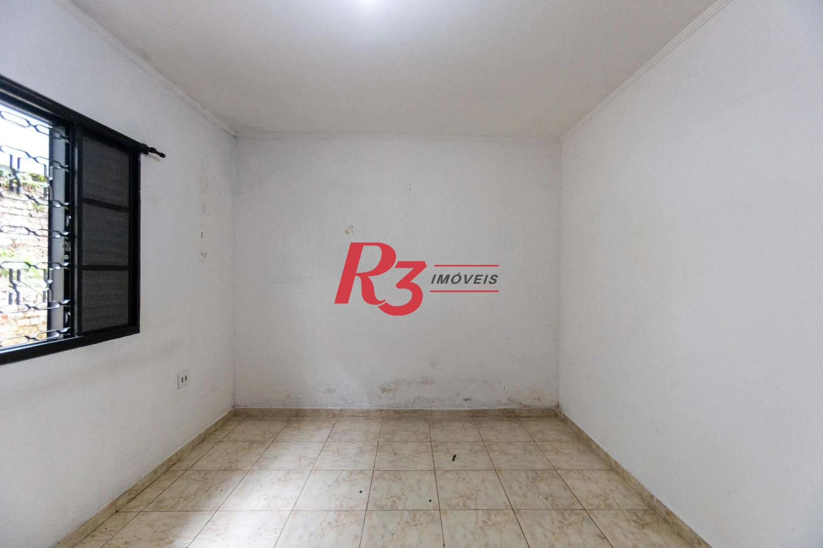 Casa com 2 dormitórios à venda, 64 m² por R$ 320.000,00 - Vila Marlthiaa - Santos/SP